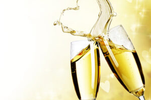 Two-Champagne-Glasses-624x557